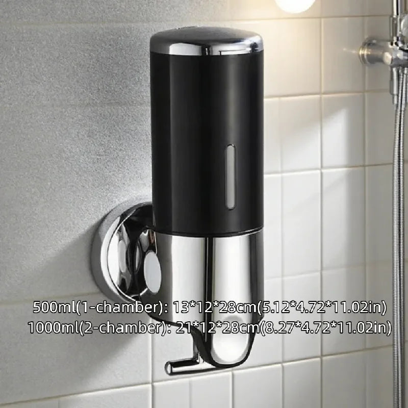 Black and chrome soap dispenser mounted on a tiled bathroom wall.